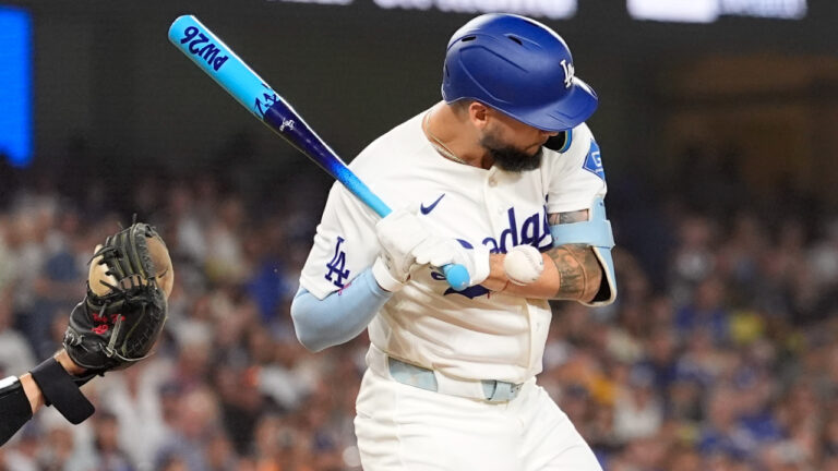 Los Angeles Dodgers' Andy Pages is hit in the hand by a pitch during the third inning of a baseball game against the Pittsburgh Pirates, Friday, Aug. 21, 2026, in Los Angeles. (Mark J. Terrill/AP)