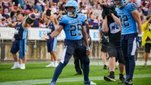 Toronto Argonauts' Samuel Hicks (25), celebrates his touchdown against the Calgary Stampeders during first half CFL football action in Toronto, on Thursday, Aug. 6, 2026. (Sammy Kogan/CP)