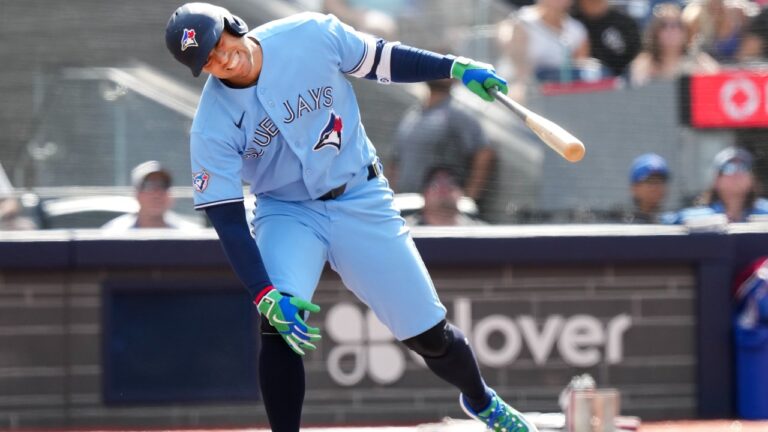 Toronto Blue Jays designated hitter George Springer reacts after hitting a pop fly out against the New York Yankees during ninth inning American League MLB baseball action in Toronto on Sunday, Aug. 16, 2026. THE CANADIAN PRESS/Nathan Denette