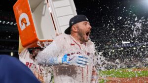 Boston Red Sox's Trevor Story is doused with a cooler of ice water after his game-winning, RBI single in the bottom ninth inning of a baseball game against the Seattle Mariners, Monday, Aug. 31, 2026, in Boston. (Charles Krupa/AP)