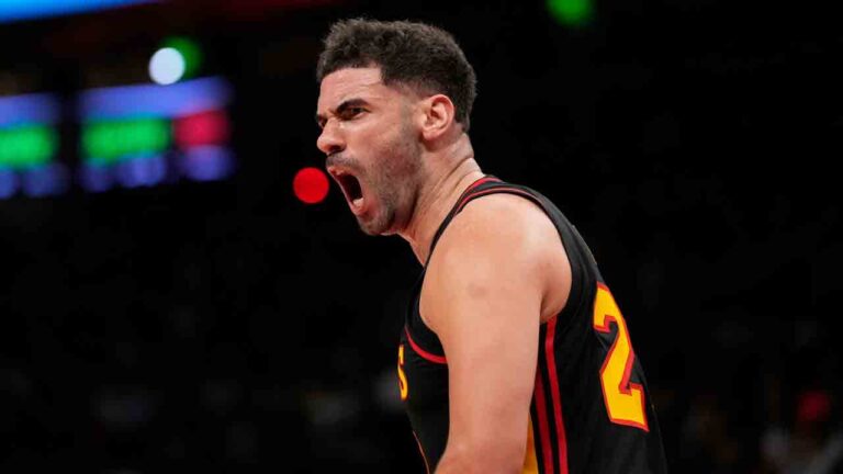 Atlanta Hawks forward Georges Niang (20) reacts after scoring n the first half of an NBA play-in tournament basketball game against the Miami Heat, Friday, April 18, 2025, in Atlanta. (Brynn Anderson/AP)