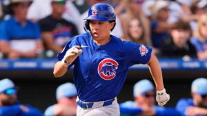 Chicago Cubs' Brett Bateman runs home to score on a two-run single hit by James Triantos during the fifth inning of a spring training baseball game against the Kansas City Royals, Monday, Feb. 23, 2026, in Surprise, Ariz. (Charlie Riedel/AP)