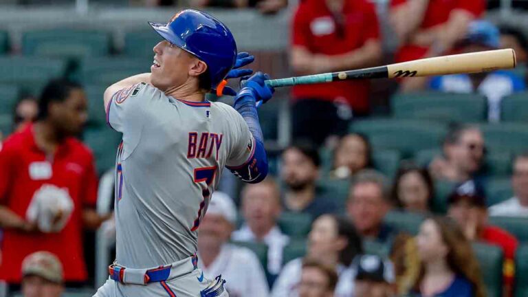 New York Mets' Brett Baty follows through on a grand slam against the Atlanta Braves during the first inning of a baseball game, Monday, Aug. 10, 2026, in Atlanta. (Erik S. Lesser/AP)