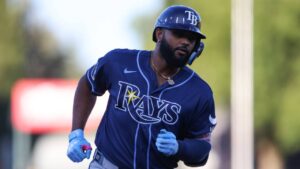 Tampa Bay Rays' Junior Caminero jogs around the bases after hitting a two-run home run during the first inning of a baseball game against the Athletics Tuesday, Aug. 11, 2026, in West Sacramento, Calif. (AP Photo/Scott Marshall)