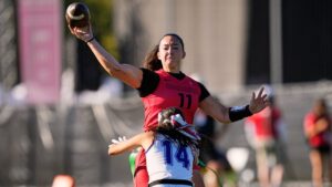 Canada's quarterback Sara Parker throws the ball during the Flag Football World Championship women's match between Canada and Panama in Duesseldorf, Germany, Thursday, Aug. 13, 2026. (AP Photo/Martin Meissner)