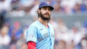 Toronto Blue Jays pitcher Dylan Cease walks back to the dugout while playing against the New York Yankees during second inning American League MLB baseball action in Toronto on Sunday, Aug. 16, 2026. THE CANADIAN PRESS/Nathan Denette