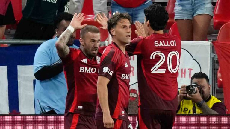 Toronto FC's Niklas Dorsch (left) celebrates with Daniel Salloi (20) and Jackson Gilman (38) after scoring against Charlotte FC during second half MLS soccer action in Toronto, on Wednesday, August 19, 2026. (Chris Young/CP)