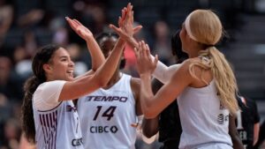 Toronto Tempo's Kiki Rice (1) celebrates with Isabelle Harrison (21) during the second half of a WNBA basketball game against the Portland Fire in Vancouver, on Friday, August 21, 2026. THE CANADIAN PRESS/Ethan Cairns