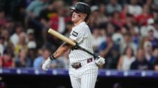 Rockies bench Cole Carrigg for inappropriate gesture to fans