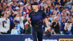 Toronto Blue Jays pitcher CJ Van Eyk (58) celebrates after the Blue Jays' win against the Seattle Mariners in MLB baseball action in Toronto, on Friday, Aug. 28, 2026. (Sammy Kogan/CP)