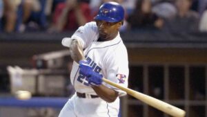 American League's Carlos Delgado, of the Toronto Blue Jays, singles to score Ichiro Suzuki of the Seattle Mariners in the third inning of the 74th annual All Star game, Tuesday, July 15, 2003 at U.S. Cellular Field in Chicago. (Mark Duncan/AP)