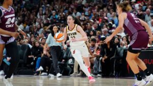 Caitlin Clark of the Indiana Fever dribbles the ball against the Toronto Tempo at Scotiabank Arena in Toronto on Aug. 18, 2026. (Chris Young/CP)