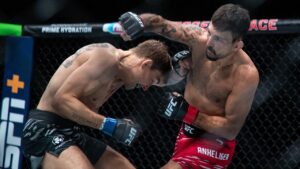 Chad Anheliger and Cody Gibson fight during a bantam weight bout at UFC Fight Night in Edmonton on Saturday, November 2, 2024. (Jason Franson/CP)