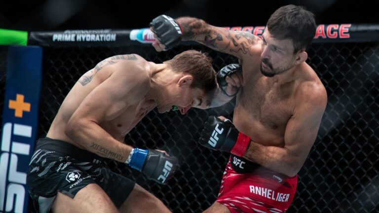 Chad Anheliger and Cody Gibson fight during a bantam weight bout at UFC Fight Night in Edmonton on Saturday, November 2, 2024. (Jason Franson/CP)