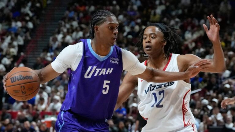 Utah Jazz's Cody Williams drives against Washington Wizards' Tre Johnson during the first half of an NBA Summer League basketball game Thursday, July 9, 2026, in Las Vegas. (John Locher/AP)