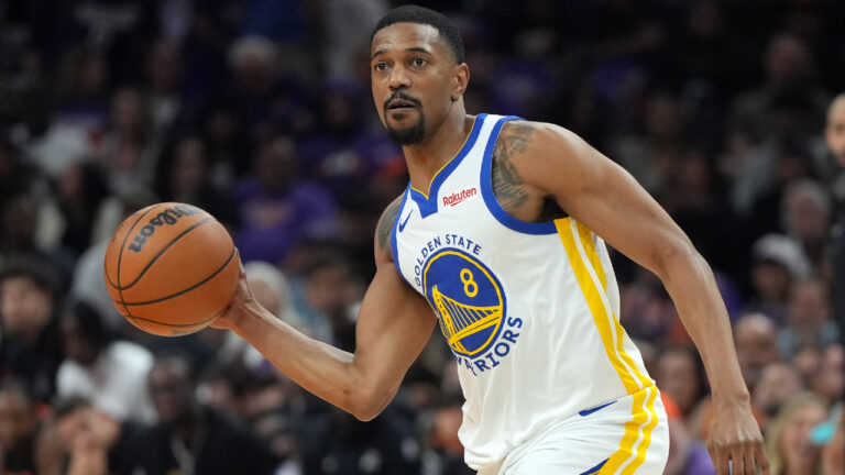 Golden State Warriors guard De'anthony Melton (8) against the Phoenix Suns during the second half of an NBA basketball play-in tournament game, Friday, April 17, 2026, in Phoenix. (Rick Scuteri/AP)