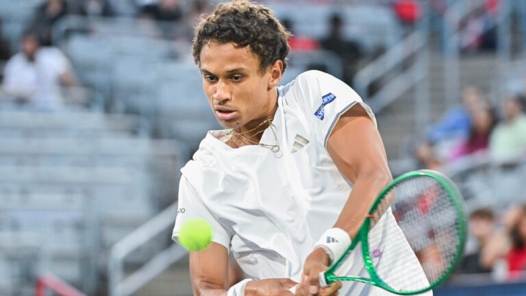 Gabriel Diallo of Canada plays a shot to Kyrian Jacquet of France during their first round match at the National Bank Open tennis tournament in Montreal, on Monday, Aug. 3, 2026. (Graham Hughes/CP)