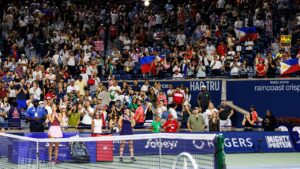 Alexandra Eala of the Philippines takes in the crowd after a 6-4, 6-0, loss to Belinda Bencic of Switzerland during round of 16 National Bank Open Tennis action in Toronto, on Sunday, Aug. 9, 2026. (Keito Newman/CP)