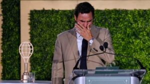 Roger Federer tries to hold back his tears during his induction ceremony at the International Tennis Hall of Fame, Saturday, Aug. 29, 2026, in Newport, R.I. (Charles Krupa/AP)
