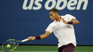 Felix Auger-Aliassime, of Canada, returns the ball to Rinky Hijikata, of Australia, during the first round of the U.S. Open tennis championships on Monday, Aug. 31, 2026, in New York. (Frank Franklin II/AP)
