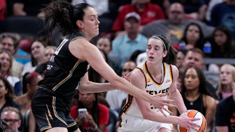 New York Liberty forward Breanna Stewart (30) defends Indiana Fever guard Caitlin Clark (22) in the first half of a WNBA basketball game in Indianapolis, Tuesday, Aug. 11, 2026. (Michael Conroy/AP)