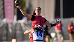 Canada's quarterback Sara Parker throws the ball during the Flag Football World Championship women's match between Canada and Panama in Duesseldorf, Germany, Thursday, Aug. 13, 2026. (AP Photo/Martin Meissner)