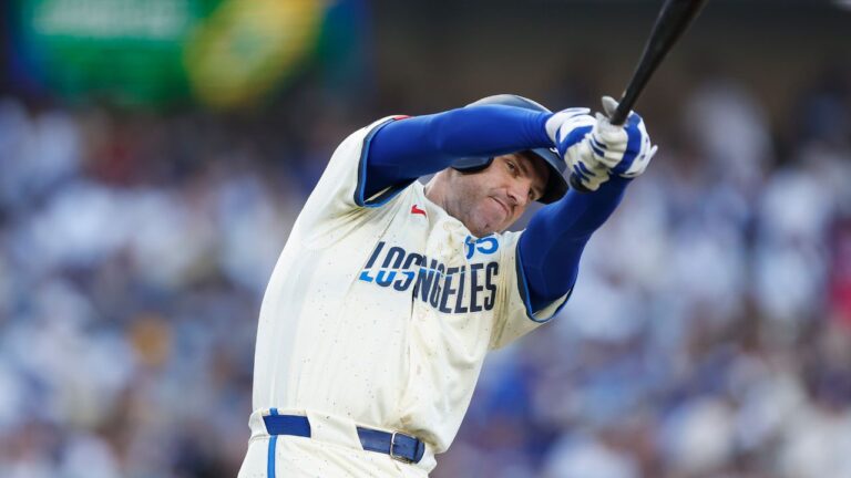 Los Angeles Dodgers' Freddie Freeman (5) practices his swing while on deck during the second inning of a baseball game against the Boston Red Sox, Saturday, Aug. 1, 2026, in Los Angeles. (Caroline Brehman/AP)