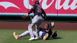 Cleveland Guardians left fielder Angel MartÃ­nez, right, celebrates with center fielder Steven Kwan after making a catch on a ball hit by Los Angeles Angels' Zach Neto during the seventh inning of a baseball game Wednesday, Aug. 26, 2026, in Anaheim, Calif. (Mark J. Terrill/AP)