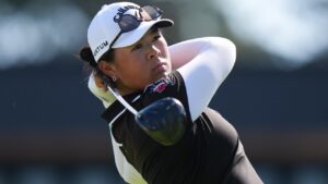 Canada's Anna Huang, of Vancouver, watches her tee shot on the 10th hole during the second round at the LPGA CPKC Canadian Women's Open golf tournament, in Edmonton, on Friday, Aug. 21, 2026. (Darryl Dyck/CP)