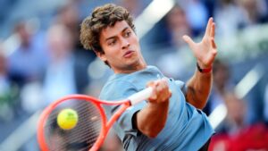 Italy's Flavio Cobolli returns to Germany's Alexander Zverev during their men's singles quarterfinal match at the Madrid Open tennis tournament in Madrid, Thursday, April 30, 2026. (Jose Breton/AP)