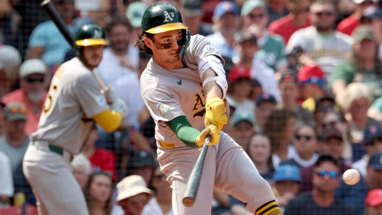 Athletics' Jacob Wilson takes a strike swinging during the fifth inning of a baseball game against the Boston Red Sox, Sunday, Aug. 9, 2026, in Boston. (AP Photo/Mark Stockwell)