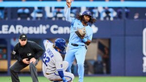 Toronto Blue Jays second baseman Charles McAdoo (26) forces out Kansas City Royals' Carter Jensen (22) during second inning MLB baseball action in Toronto, on Thursday, Aug. 27, 2026. (Sammy Kogan/CP)