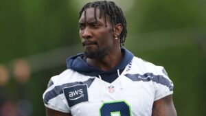 Seattle Seahawks linebacker DeMarcus Lawrence looks on during the NFL football team's training camp, Saturday, July 25, 2026, in Renton, Wash. (AP Photo/Lindsey Wasson)