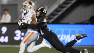 Ottawa Redblacks defensive back King Ambers (27) tackles BC Lions wide receiver Jermaine Jackson (84) the ball during first half CFL football action in Ottawa, Sunday, Aug. 30, 2026. THE CANADIAN PRESS/Chris Tanouye