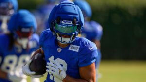 Los Angeles Rams wide receiver Puka Nacua runs the ball during the NFL football team's training camp, Thursday, Aug. 6, 2026, in Los Angeles. (Mark J. Terrill/AP)