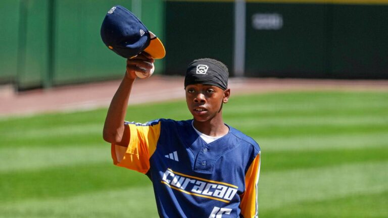 Curacao's Jaymiell Martina (16) tips his cap after reaching his pitch count limit during the sixth inning of the International Championship baseball game Japan at the Little League World Series tournament in South Williamsport, Pa., Saturday, Aug. 29, 2026. (Gene J. Puskar/AP)