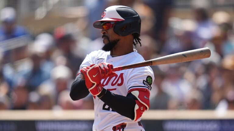 Minnesota Twins' Byron Buxton (25) grounds into a fielder's choice to score Victor Caratini during the third inning of a baseball game against the Atlanta Braves, Wednesday, Aug. 19, 2026, in Minneapolis. (Abbie Parr/AP)