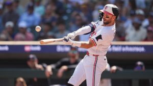 Minnesota Twins' Cody Clemens hits an RBI-single during the seventh inning of a baseball game against the Atlanta Braves, Wednesday, Aug. 19, 2026, in Minneapolis. (Abbie Parr/AP)