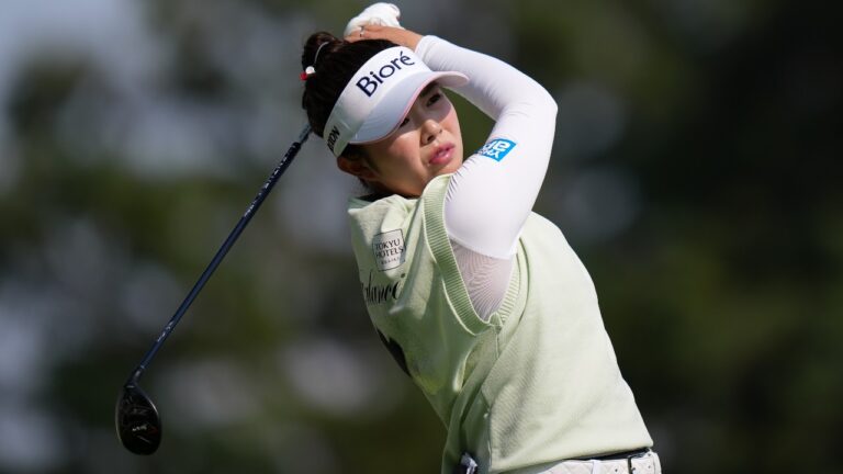 Miyu Yamashita, of Japan, watches her tee shot on the fifth hole during the final round at the LPGA CPKC Canadian Women's Open golf tournament, in Edmonton, on Sunday, Aug. 23, 2026. (Darryl Dyck/CP)