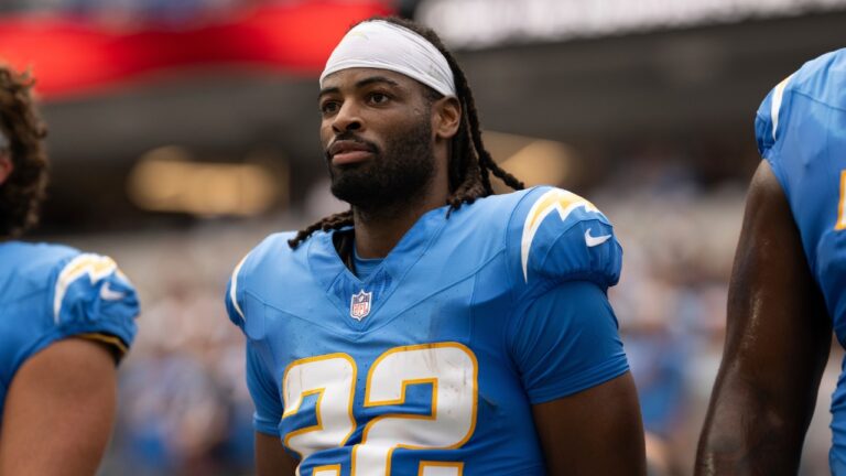 FILE - Los Angeles Chargers running back Najee Harris (22) stands for the National Anthem before an NFL football game against the Denver Broncos, Sept. 21, 2025, in Inglewood, Calif. (Kyusung Gong/AP)