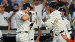 New York Yankees designated hitter Ben Rice, right, celebrates with teammate first baseman Luis García Jr. after hitting a solo home run during the first inning of a baseball game against the Houston Astros Wednesday, Aug. 26, 2026, in New York. (Ryan Murphy/AP)