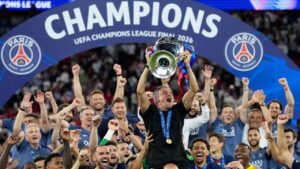 PSG's head coach Luis Enrique lifts the trophy celebrating after winning the Champions League final soccer match between Paris Saint-Germain and Arsenal in Budapest, Hungary, Saturday, May 30, 2026. (Petr Josek/AP)