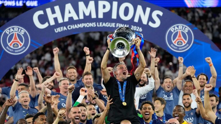 PSG's head coach Luis Enrique lifts the trophy celebrating after winning the Champions League final soccer match between Paris Saint-Germain and Arsenal in Budapest, Hungary, Saturday, May 30, 2026. (Petr Josek/AP)
