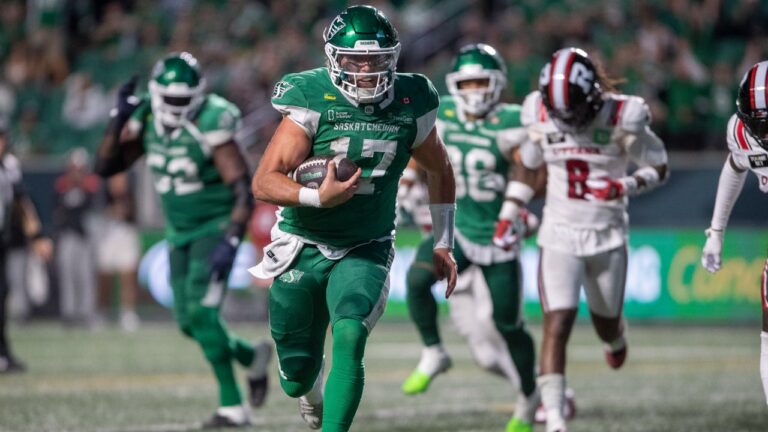 Saskatchewan Roughriders quarterback Tommy Stevens (17) runs the ball for a touchdown against the Ottawa Redblacks during second half CFL football action in Regina on Friday, August 7, 2026. (Kayle Neis/CP)
