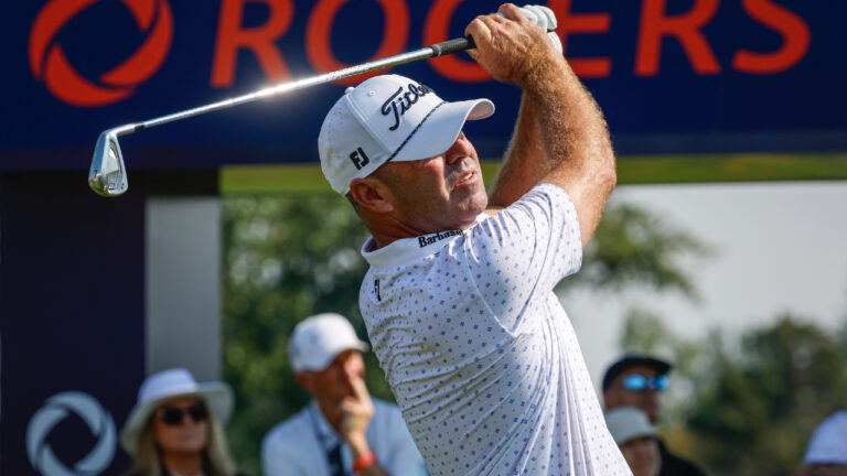 Ryan Armour, of the United States, hits a tee shot on the sixteenth hole during the PGA Tour Champions golf event in Calgary, Alta., Saturday, Aug. 22, 2026. (Jeff McIntosh/CP)