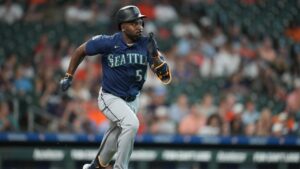 Seattle Mariners' Randy Arozarena runs up the line after hitting his RBI single against Houston Astros starting pitcher Hunter Brown during the third inning of a baseball game, Sunday, Aug. 16, 2026, in Houston. (Karen Warren/AP)