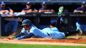 Toronto Blue Jays' George Springer scores on a sacrifice fly ball by Daz Cameron during the fourth inning of a baseball game against the New York Yankees Sunday, Aug. 23, 2026, in New York. (Frank Franklin II/AP)
