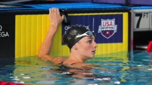 Summer McIntosh, of Canada, looks at the scoreboard after competing in the women's 200-meter freestyle final at the Pan Pacific Swimming Championships in Irvine, Calif., Wednesday, Aug. 12, 2026. (AP Photo/Jae C. Hong)