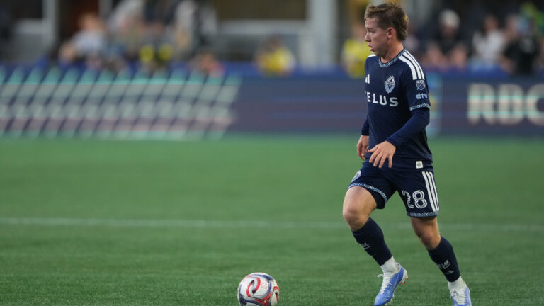 Vancouver Whitecaps defender Tate Johnson in action against the Seattle Sounders during the first half of an MLS soccer match, Sunday, Aug. 16, 2026, in Seattle. (Lindsey Wasson/AP)