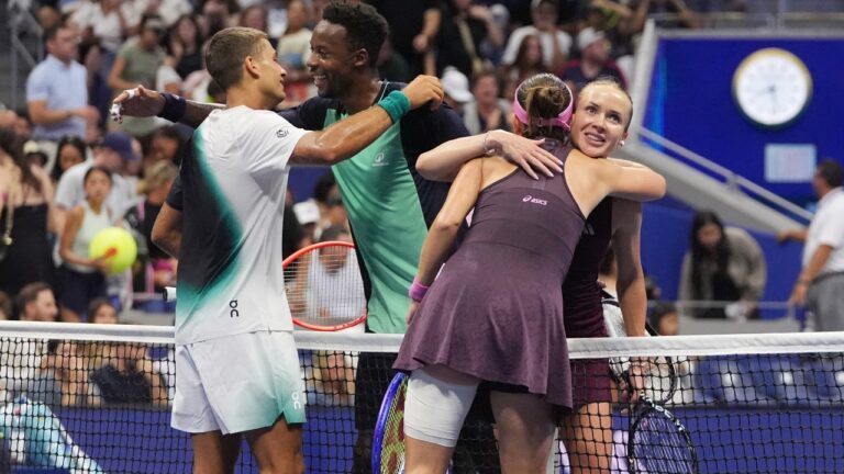 Belinda Bencic, of Switzerland, and Flavio Cobolli, of Italy, left, greet Elina Svitolina, right, of Ukraine, and Gael Monfils, second from left, of France, after Bencic and Cobolli won a mixed doubles semifinal match at the U.S. Open tennis championships Wednesday, Aug. 26, 2026, in New York. (AP Photo/Frank Franklin II)